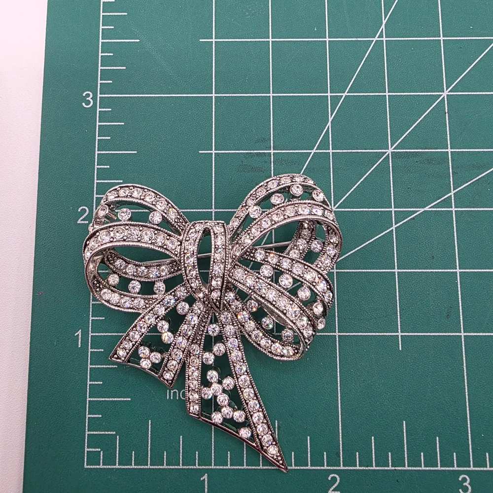 Joan Rivers Crystal and Silver Bow Brooch
